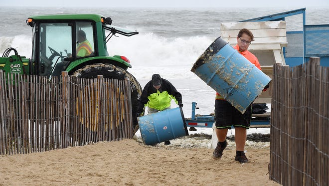 City crews removed trash cans from Rehoboth Beach near the boardwalk as a precaution.