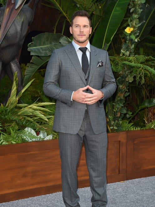 Chris Pratt talked on the carpet about how director J.A. Bayona would scare cast members by playing unexpected dino roars. "It never really worked on me because I was always in on the joke," he said.