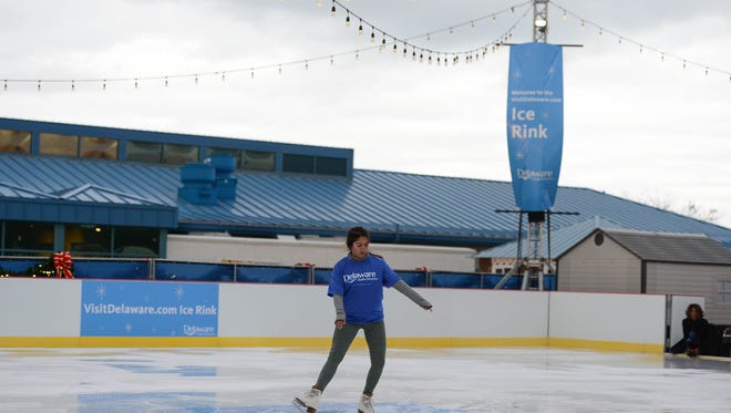 Victoria VanMeter, volunteer, tests out the "Visit Delaware Ice Rink" at the Winter Wonderfest Center located at the Cape May-Lewes Ferry Terminal and also in the Cape Henlopen State Park. That will run Nov. 17 to December 31, 2017.