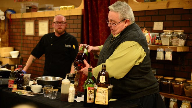 Blackwall Hitch's bartender Patrick Hurley fixes the signature drink of the night, a maple walnut Manhattan, during the Taste & Learn Chef Series 2018 held at The Spice & Tea Exchange in Rehoboth Beach on Monday.