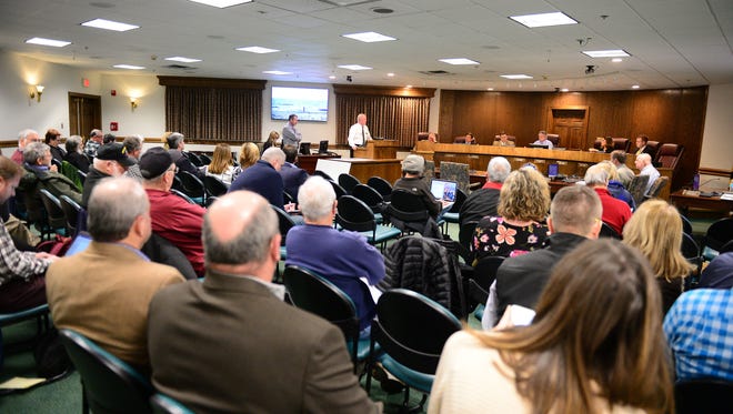 Ocean City Mayor Rick Meehan and City Engineer Terry McGean address the Ocean City Town Council and the public about the opposition of permanent offshore wind turbines visible from the shoreline on Monday, Feb. 5, 2018.