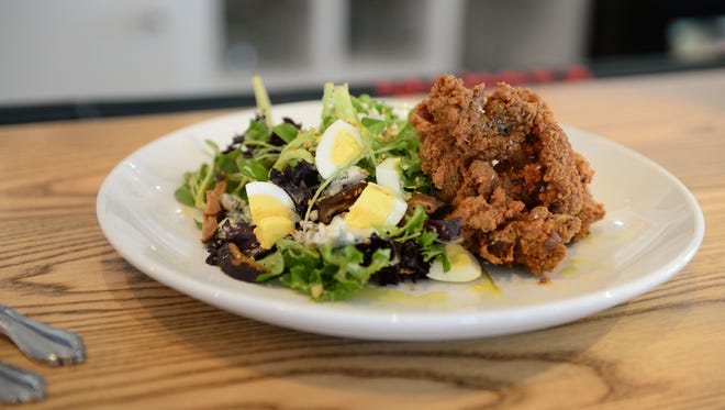 One of the featured menu items that day: fried chicken livers, served with mixed greens, hard-boiled egg, kimchi aoli and buttermilk blue cheese dressing.