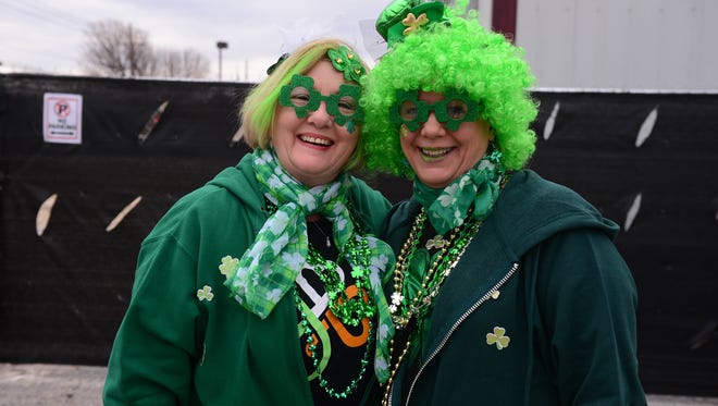 Jennifer Brillhart, Ocean Pines, and Amy McLughlin, Pa. shows off their St. Patricks Day pride during the Delmarva-Irish American Club's 39th annual Ocean City St. Patrick’s Day Parade in Ocean City, Md. on Saturday, March 17, 2018.