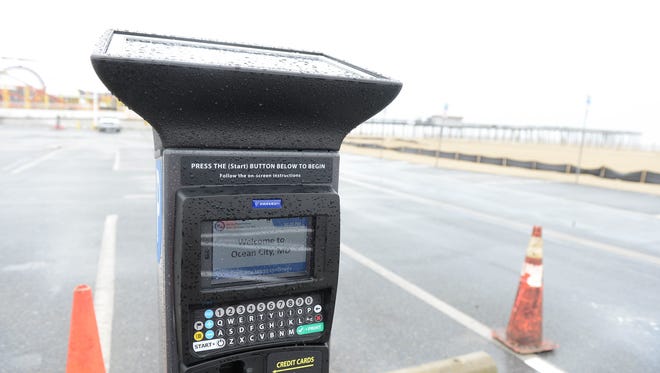Solar-powered kiosks will take over the old "pay-and-display" method, where visitors used to exhibit a printed receipt, according to an Ocean City town release. Friday, March 30, 2018.