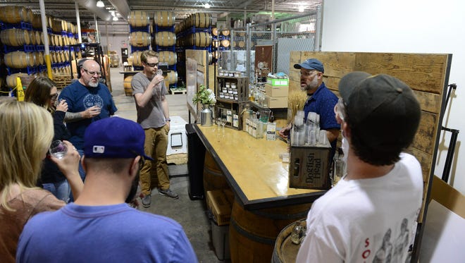 Lars Ryan, Off-Centered Experience Ambassador, teaches the history of vodka and gin, along with sampling during the new distillery tour at the Dogfish Head Milton Brewery and Distillery on Wednesday, May 16, 2018.