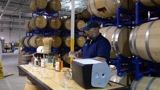 Lars Ryan, Off-Centered Experience Ambassador, teaches about rum, along with sampling during the new distillery tour at the Dogfish Head Milton Brewery and Distillery on Wednesday, May 16, 2018.