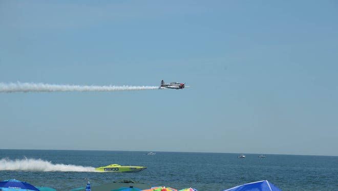 A GEICO Skytyper races Miss GEICO during the 2018 Ocean City Air Show on Saturday, June 16, 2018