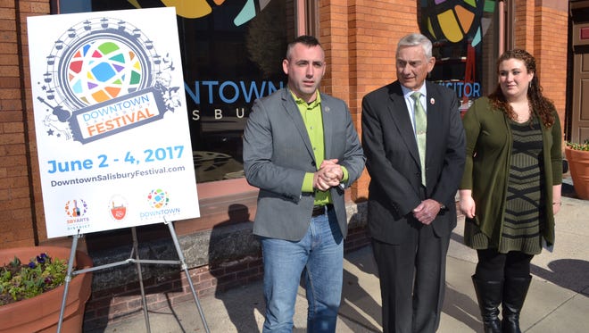 Salisbury Mayor Jake Day, left, announces the city will host the Downtown Salisbury Festival on June 2-4. With him are Ernie Colburn, president and CEO of the Salisbury Area Chamber of Commerce, and Jamie Heater, executive director of the Salisbury Arts and Entertainment District.