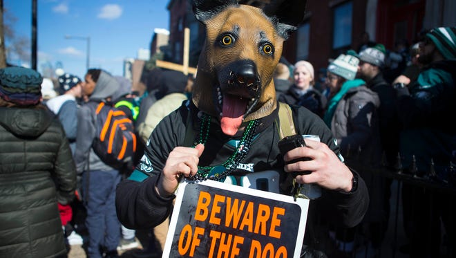 Philadelphia Eagles fans celebrate their first Super Bowl Championship with a parade down Broad Street to the Philadelphia Art Museum.