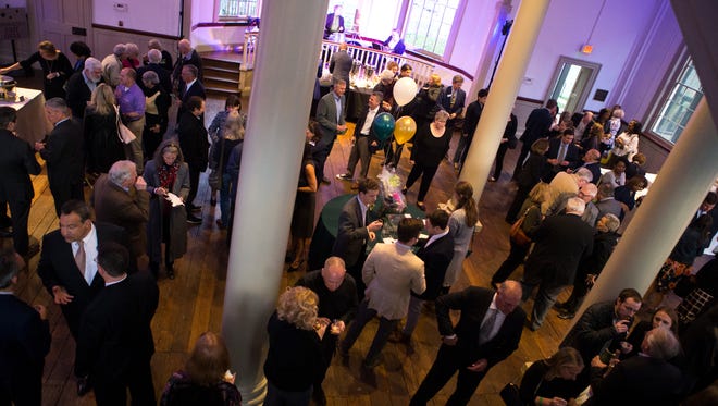 Attendees at the 2018 Delaware History Makers Award & Celebration enjoy food and drinks at the Delaware Historical Society Thursday in Wilmington.