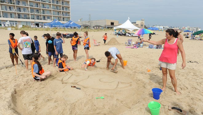 Students from the Mariner Middle School near Milton got together to make a viking at he 38th Annual Rehoboth Beach-Dewey Beach Chamber of Commerce Sandcastle Contest.