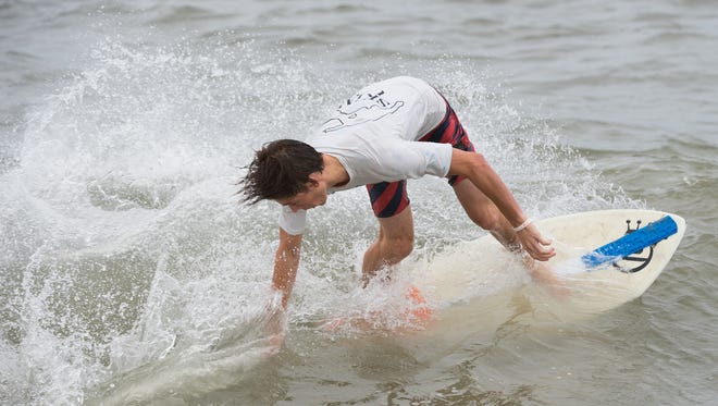 Carter Hill of Rehoboth, Del., competes in the semi pro division at the Zap Pro/Amateur World Championships of Skimboarding at Dewey Beach.
