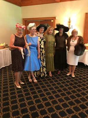 Celebrating the 80th anniversary of the Sussex Gardeners Club at a luncheon at Kings Creek Country Club members dressed in vintage attire. From left are: Donna Fellows, Kathy Ackerman, Marty Last, Lucy Fleming, Willa Jones and Karen Coombe.