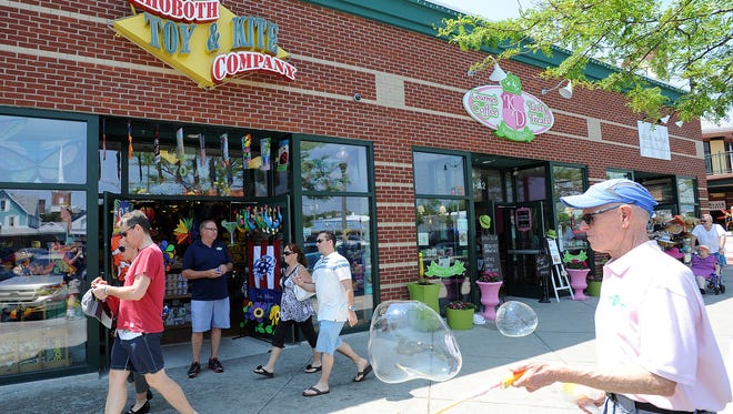 Jack Vassalotti makes bubbles at Rehoboth Toy & Kite Co. on Rehoboth Avenue the Friday before Memorial Day.