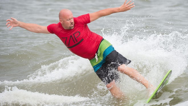 Toby West of Williamsburg, Va., competes in the senior grandmaster division at the Zap Pro/Amateur World Championships of Skimboarding at Dewey Beach.