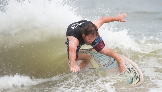 Justin Redefer of Dewey Beach, Del., competes in the senior grandmaster division at the Zap Pro/Amateur World Championships of Skimboarding at Dewey Beach.