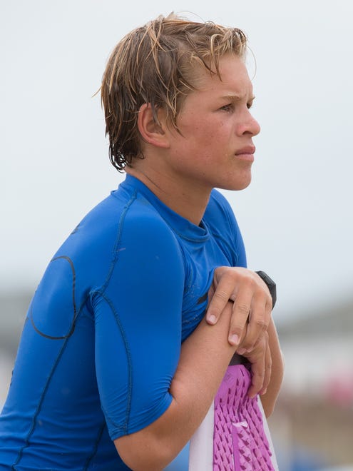 Timmy Vitella of Milton, Del., waits for a wave during the semi pro division competition at the Zap Pro/Amateur World Championships of Skimboarding at Dewey Beach.