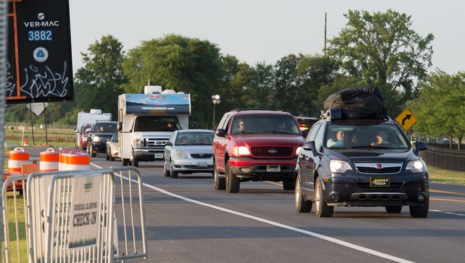 Firefly Traffic moves along Leipsic Road behind Dover Downs in Dover.