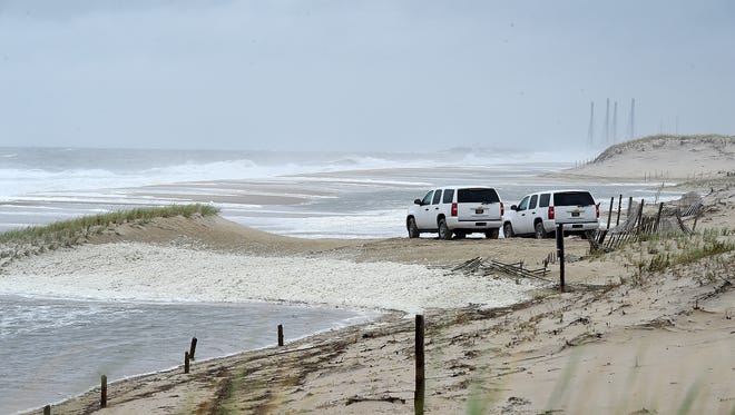 Large waves from Hurricane Jose breached a dune line south of Dewey Beach that resulted in flooding on Coastal Highway.