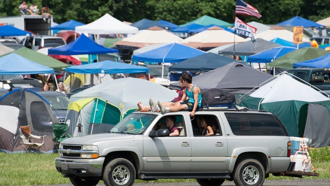 Campers arrival to the Firefly Music Festival in Dover.