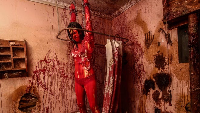 Frightland, complete with this bloody bathroom scene, opens its regular season Friday near Middltown.