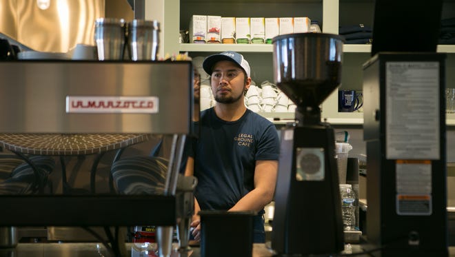 Barista Rico Adams works at Legal Grounds Cafe in Elsmere.