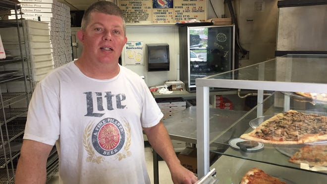 Bradley Keech, owner at DePietro's NY Pizzeria on Milford Street in Salisbury, hopes to see a boost in business with people coming into the area with Salisbury University's graduation.