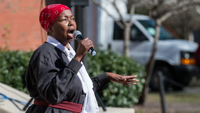 Eunice Seagraves performs as Harriet Tubman during a visit from U.S. Sen. Chris Van Hollen at the UMES Frederick Douglass Library on Monday, Feb. 20, 2017.