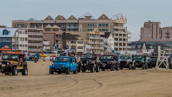 The Beach Jeep Crawl this morning in Ocean City had 250 jeeps that drove on the beach from 29th Street to the inlet parking lot.  Jeeps came from West Virginia, Virginia, Maryland, Pennsylvania, Ohio, New York, and Canada.