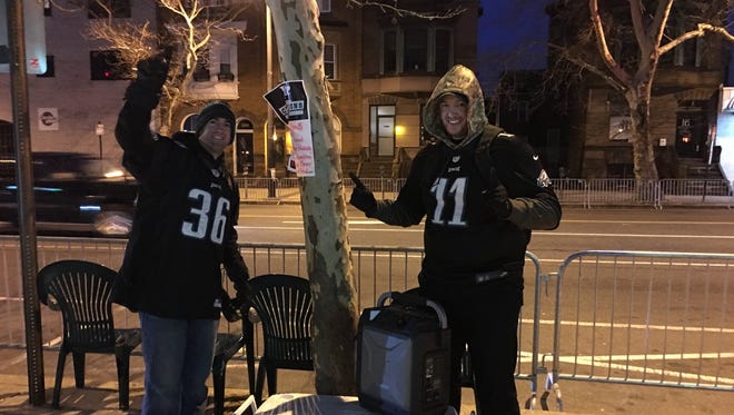 These fans got a spot along the Philadelphia Eagles parade route at 6 a.m. this morning -- along with a 100-pound cooler of beer and a karaoke machine.