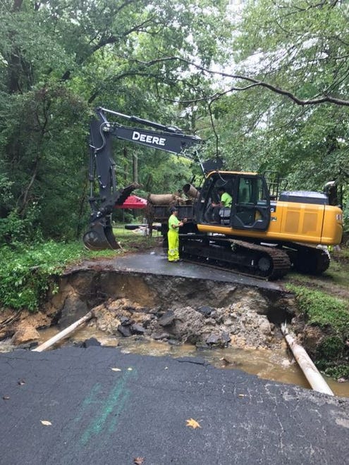 Bell Island Trail in Harbor Point/Cotton Patch, off Pemberton Drive in Salisbury, is washed out after flooding on Saturday, Aug. 12.