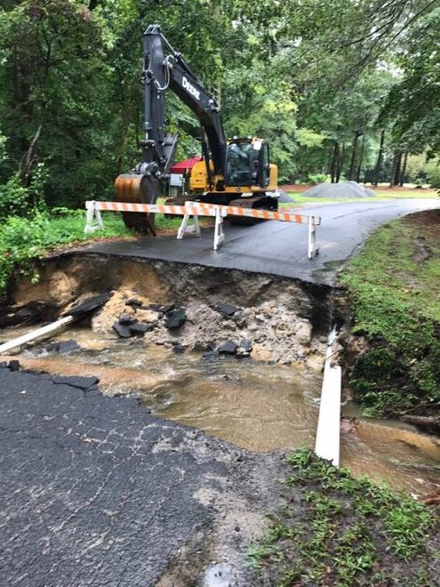 Bell Island Trail in Harbor Point/Cotton Patch, off Pemberton Drive in Salisbury, is washed out after flooding on Saturday, Aug. 12.
