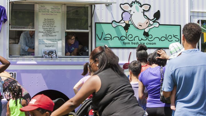 Attendees wait in line at its food truck for Vanderwende's ice cream at the Ice Cream Festival in Wilmington. The restaurant, Vanderwende Farm Creamery (vanderwendefarmcreamery.com), in Bridgeville gets rave reviews online. More than nine in 10 visitors giving it an “excellent” rating on TripAdvisor.