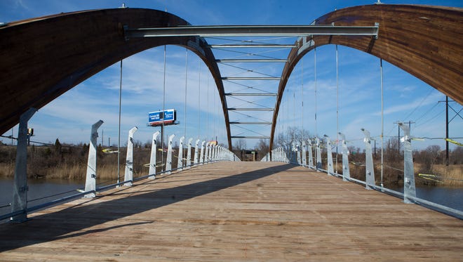 Take the new Jack A. Markell Trail through Wilmington ' s marshes from Wilmington to New Castle.