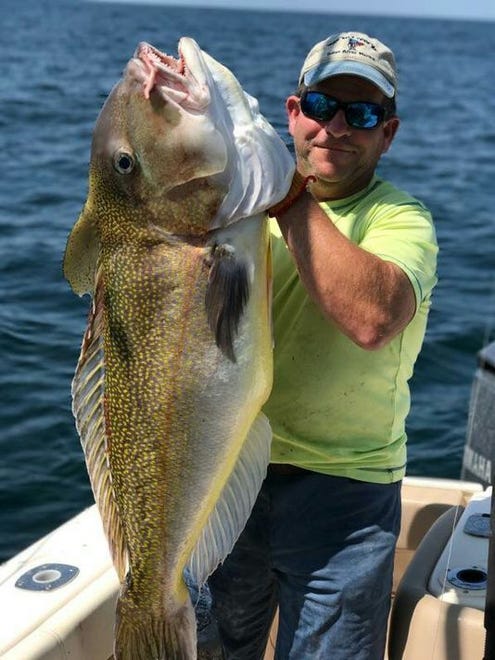 Tom Schanno holds a new state record golden tilefish. The record setting fish weighed 46-pounds 8-ounces, and measured 47 inches with a 29-inch girth.