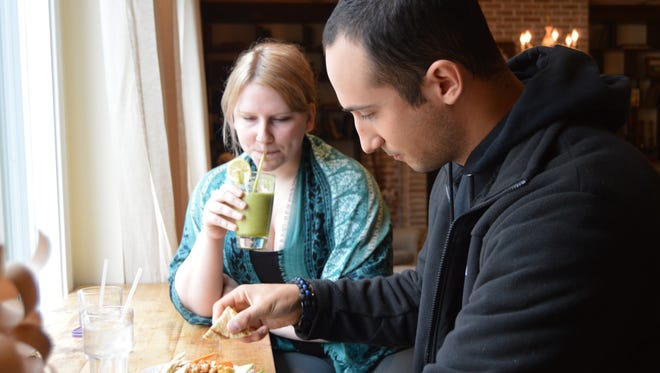 Rachael Long and Dan Reshef enjoy lunch at Nectar Cafe and Juice Bar.