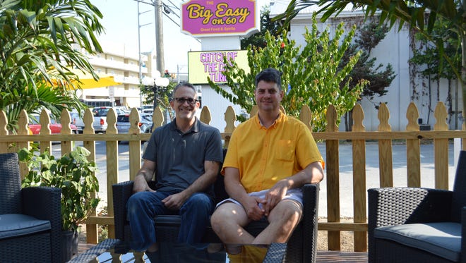 Owner of The Big Easy on 60, Mark Hall (right) sits with restaurant manager, Lewis Sherman.