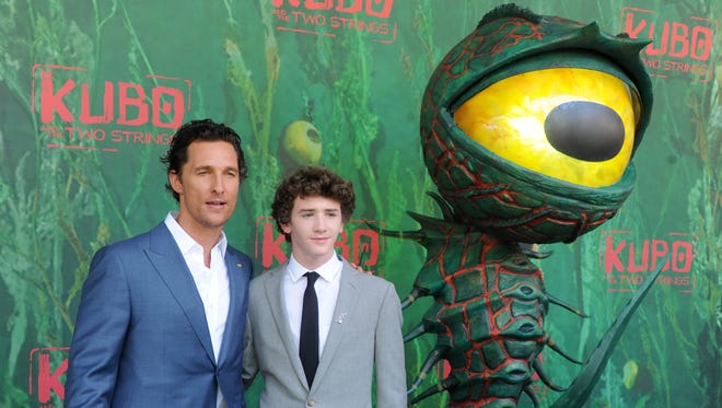 UNIVERSAL CITY, CA - AUGUST 14:  Actors Matthew McConaughey and Art Parkinson arrive at the premiere of Focus Features' "Kubo And The Two Strings" at AMC Universal City Walk on August 14, 2016 in Universal City, California.  (Photo by Gregg DeGuire/WireImage) ORG XMIT: 660307717 ORIG FILE ID: 589531658