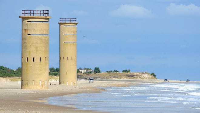 World War II sentry towers along the Delaware coast give beaches near Cape Henlopen a unique view.