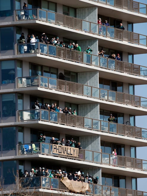 Fans line balconies before a Super Bowl victory parade for the Philadelphia Eagles football team, Thursday, Feb. 8, 2018, in Philadelphia. The Eagles beat the New England Patriots 41-33 in Super Bowl 52.