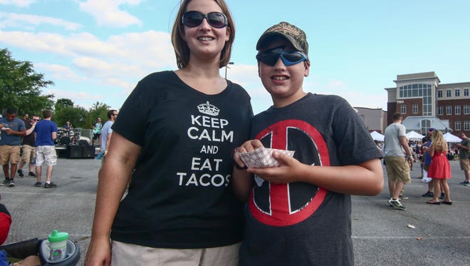 Mary and Drew Pieri, 9, hit the first Delaware Taco Festival on  Saturday, June 25, 2016, at Frawley Stadium in Wilmington.