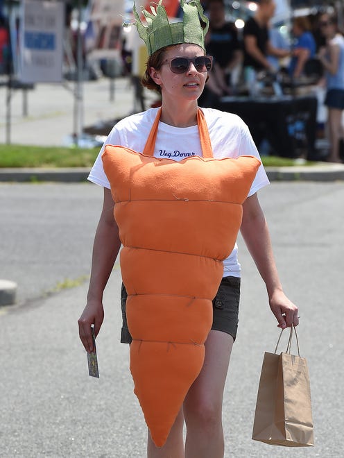 Danielle Metcalfe from "Veg Dover" is dressed as a carrot.