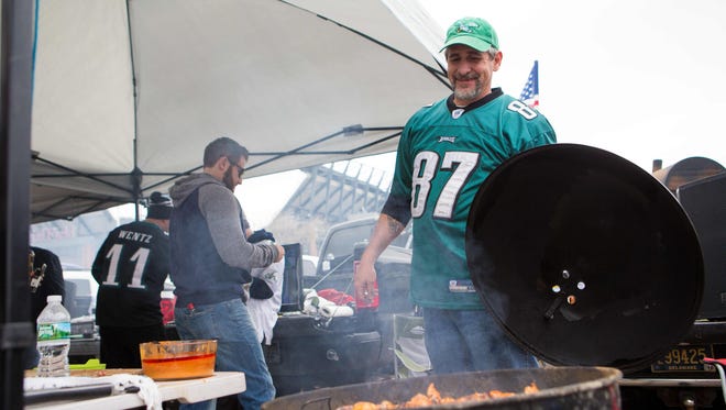 Henry Bufano, 48, of Newark tailgates early Sunday morning as they prepare for the Philadelphia Eagles to take on the visiting Minnesota Vikings in the NFC Championship game at Lincoln Financial Field.