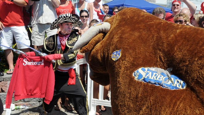 A matador squares off with the bull, at Dewey Beach's annual July event.
