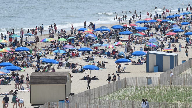 Visitors crowd Rehoboth Beach on Memorial Day weekend.