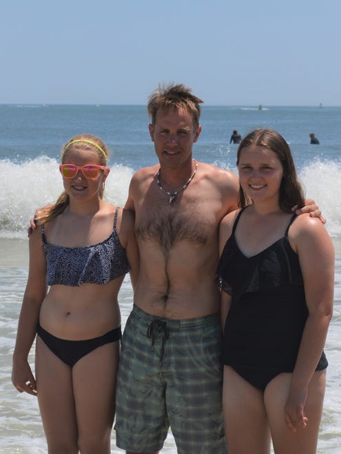 Carly, Mark, and Cori Galbraith at the Delaware Seashore State Park beach in 2016. Mark's family has been going to the park since the 1940s.