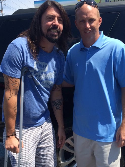 Rick Cooper with Dave Grohl at Atlantic Liquors near Rehoboth Beach Sunday.