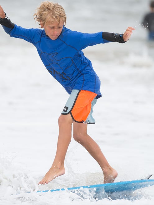 Cooper Forcucci of Rehoboth Beach, Del., competes in the menehune division at the Zap Pro/Amateur World Championships of Skimboarding at Dewey Beach.