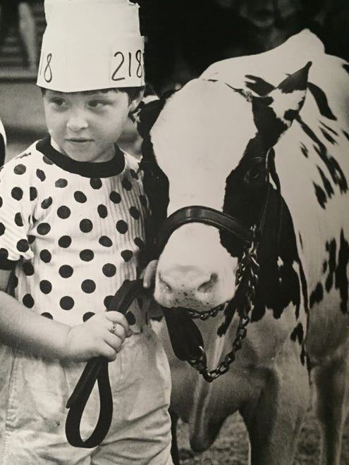 1988: Jennifer Hudson, of Viola, won fifth place with her dairy cow. See more vintage images of the Delaware State Fair.