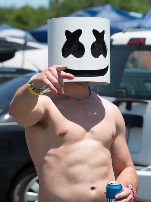 Andrew Sussman of North Jersey wears a marshmallow mask in the north camping area at the Firefly Music Festival in Dover.